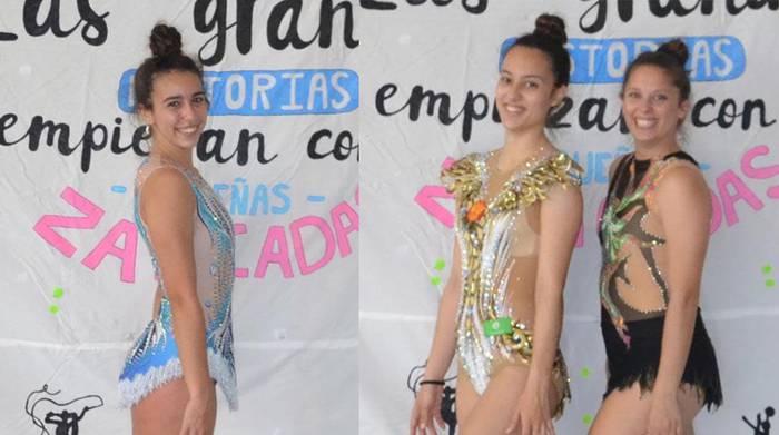 LOKEko lau gimnasta Amateur txapelketako podiumean